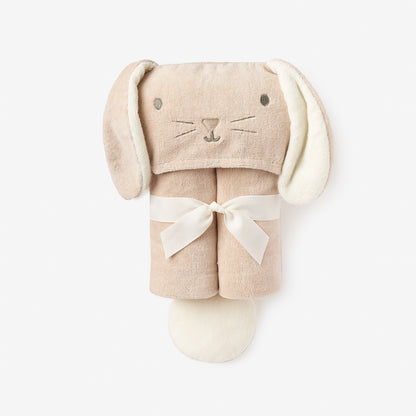 Elegant Baby towel shaped like a bunny with a white bow on a white background