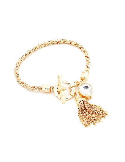 GOLD BRAIDED TOGGLE BRACELET WITH GOLD FRINGE AND CLEAR STONE