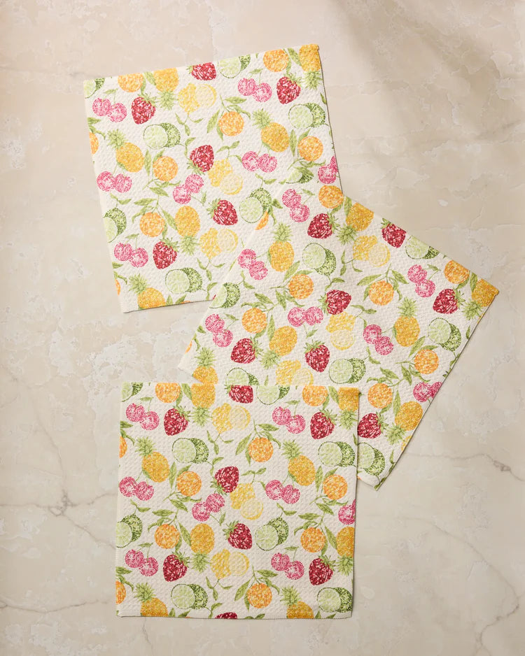 Geometry set of 3 dischcloths with a colorful fruit disco pattern on a marble surface.
