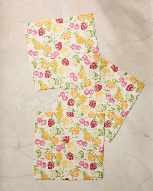 Geometry set of 3 dischcloths with a colorful fruit disco pattern on a marble surface.