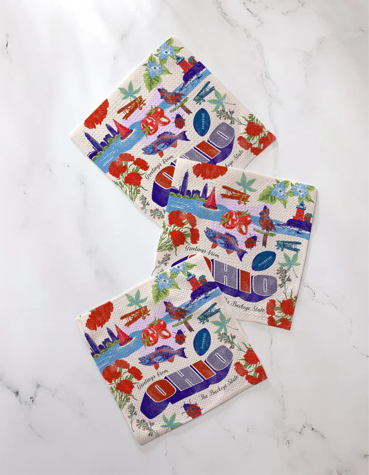 Set of three colorful Geometry dishcloths with Ohio theme with various designs on a marble surface