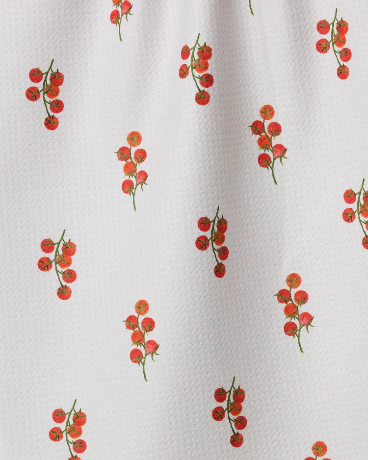 Geometry tea towel Pattern of red ripe and ready scattered tomatoes on a white background