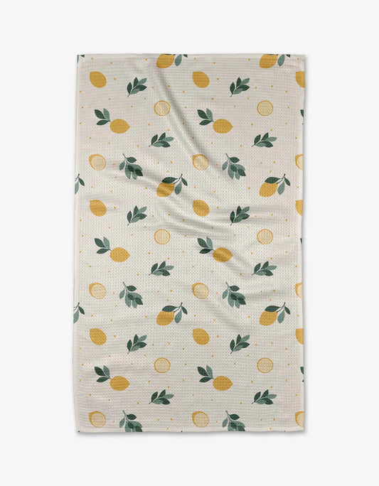 Geometry freshly picked tea towel with off white towel and a yellow lemon pattern with green leaves