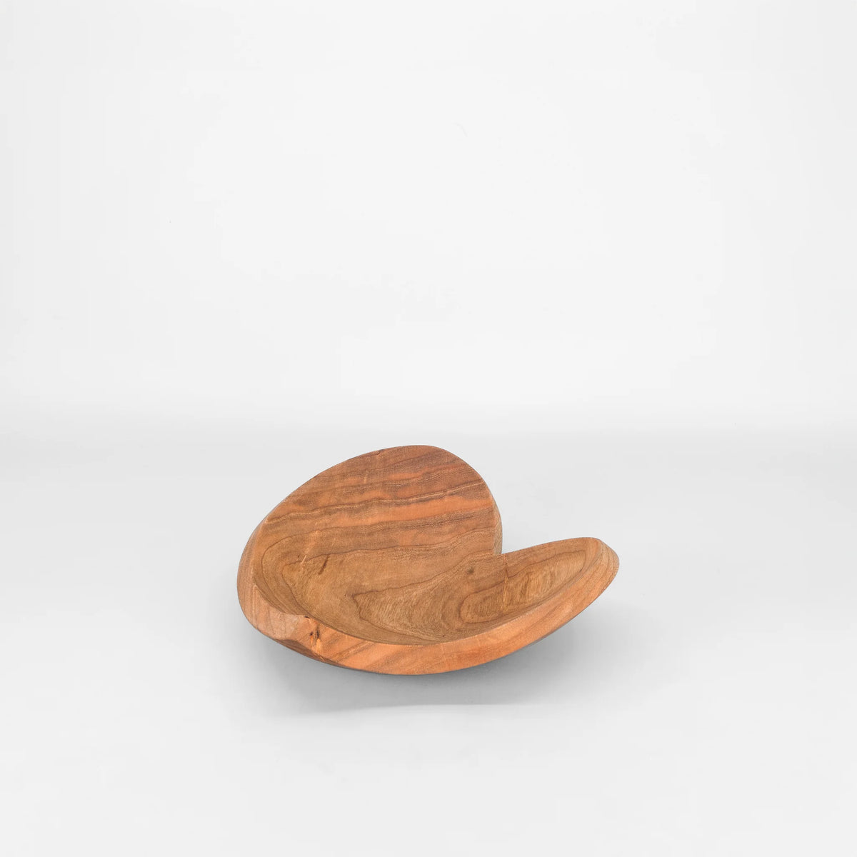 9 inch teardrop heart shaped wooden bowl by Holland Bowl Mill with Faith Hope and Love engraved on the bottom.
