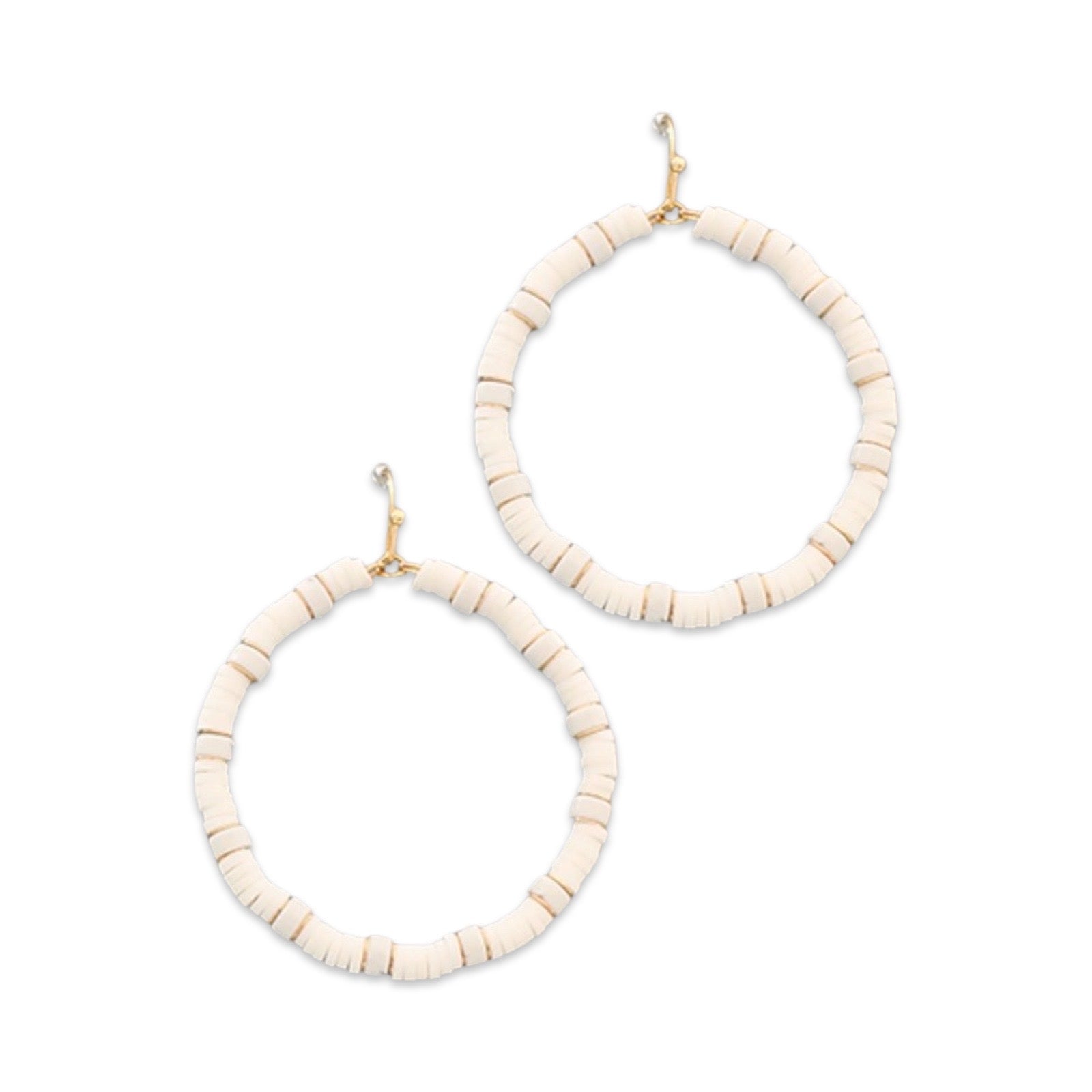 Pair of white rubber hoop earrings by Pierce & Hide on a white background