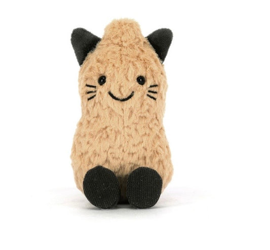 A small plush cat toy in a warm beige/tan color with black ears, black eyes, whiskers, and black paws, sitting against a plain white background.