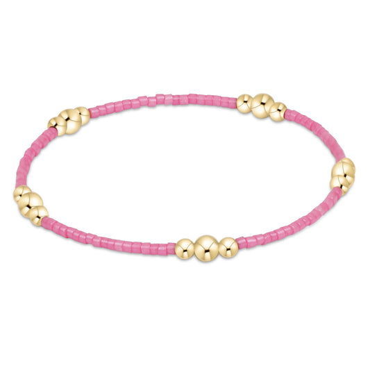 enewton Bubblegum Pink hope purpose beaded bracelet with gold beads on a white background