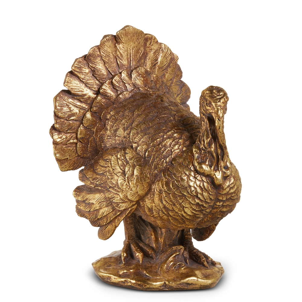 Bronze statue of a turkey on a white background