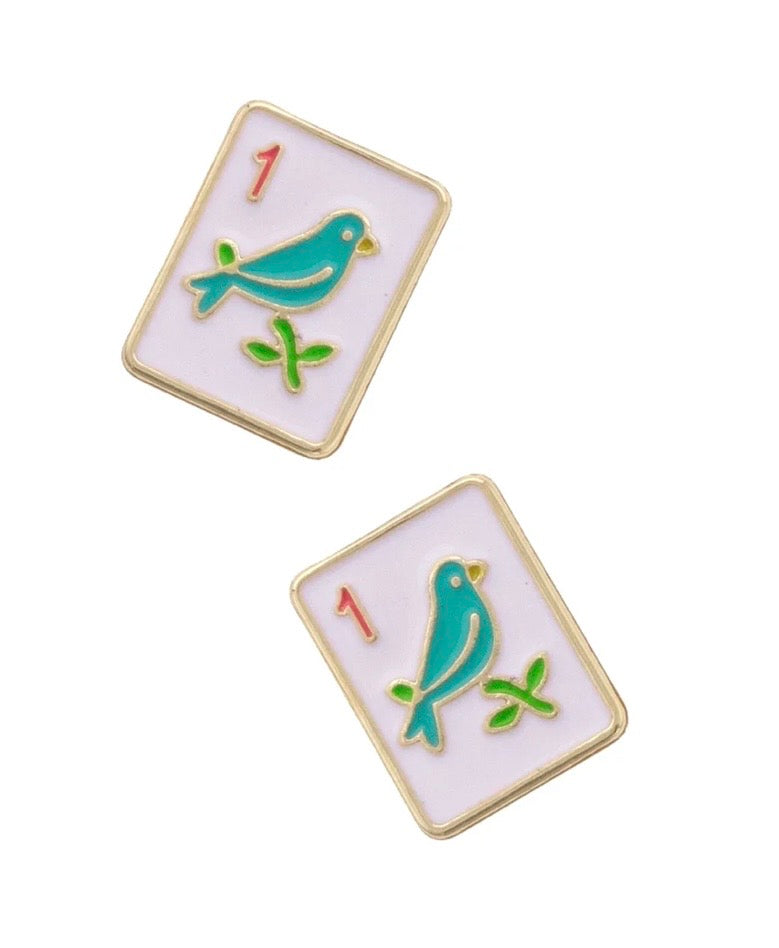 A pair of rectangular enamel pins designed like playing card 1 suits, featuring a turquoise bird on a green branch with a red number 1 on a pale pink background, outlined in gold-tone metal.