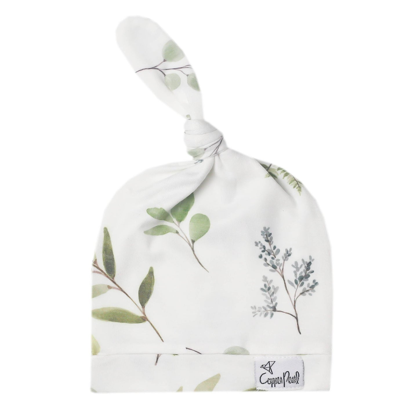 Cooper Pearl baby top knot hat in Haven pattern with white hat and twigs of green leaves and blue flowers.