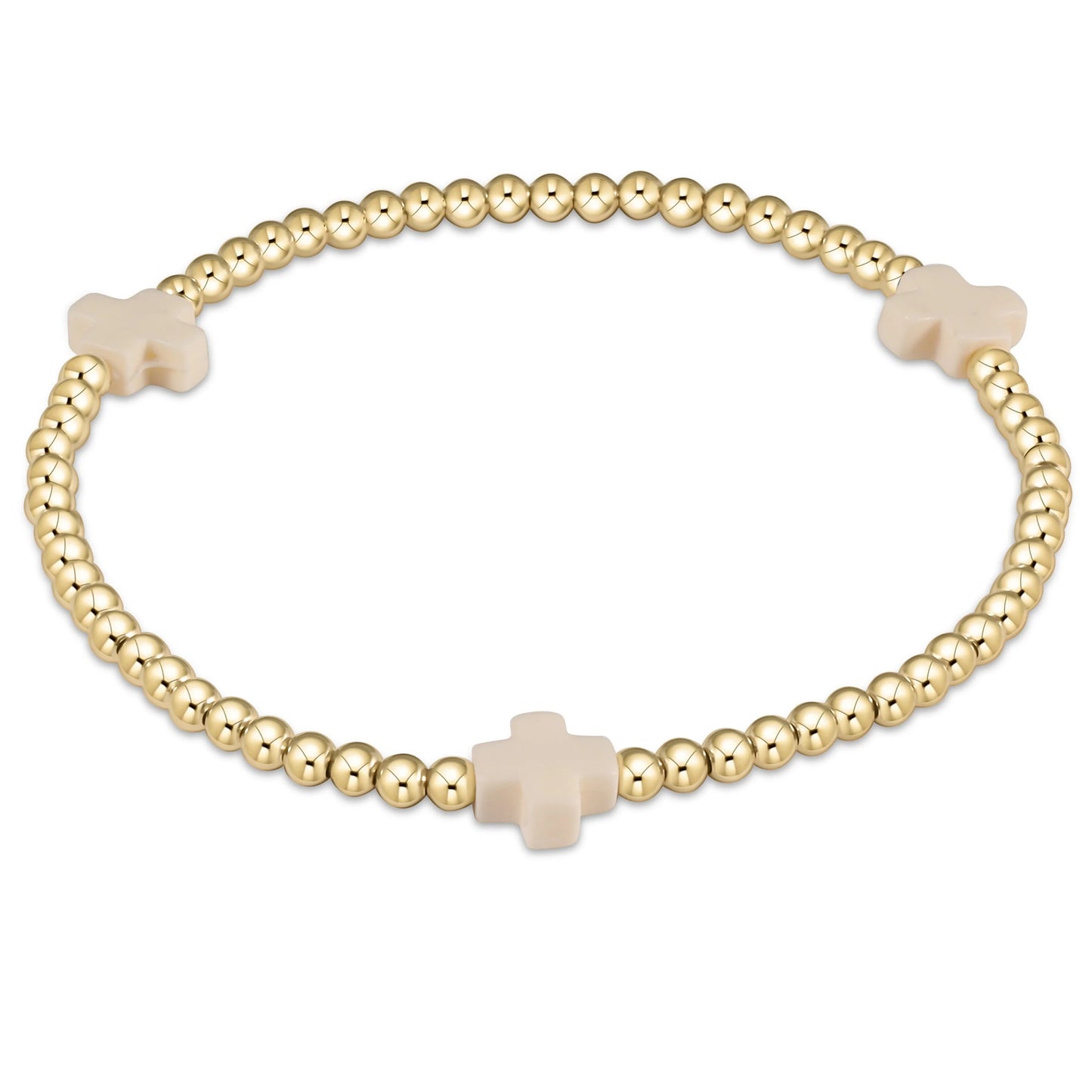 An enewton signature cross gold-colored bracelet with off-white beads and a cross pattern, designed for women.