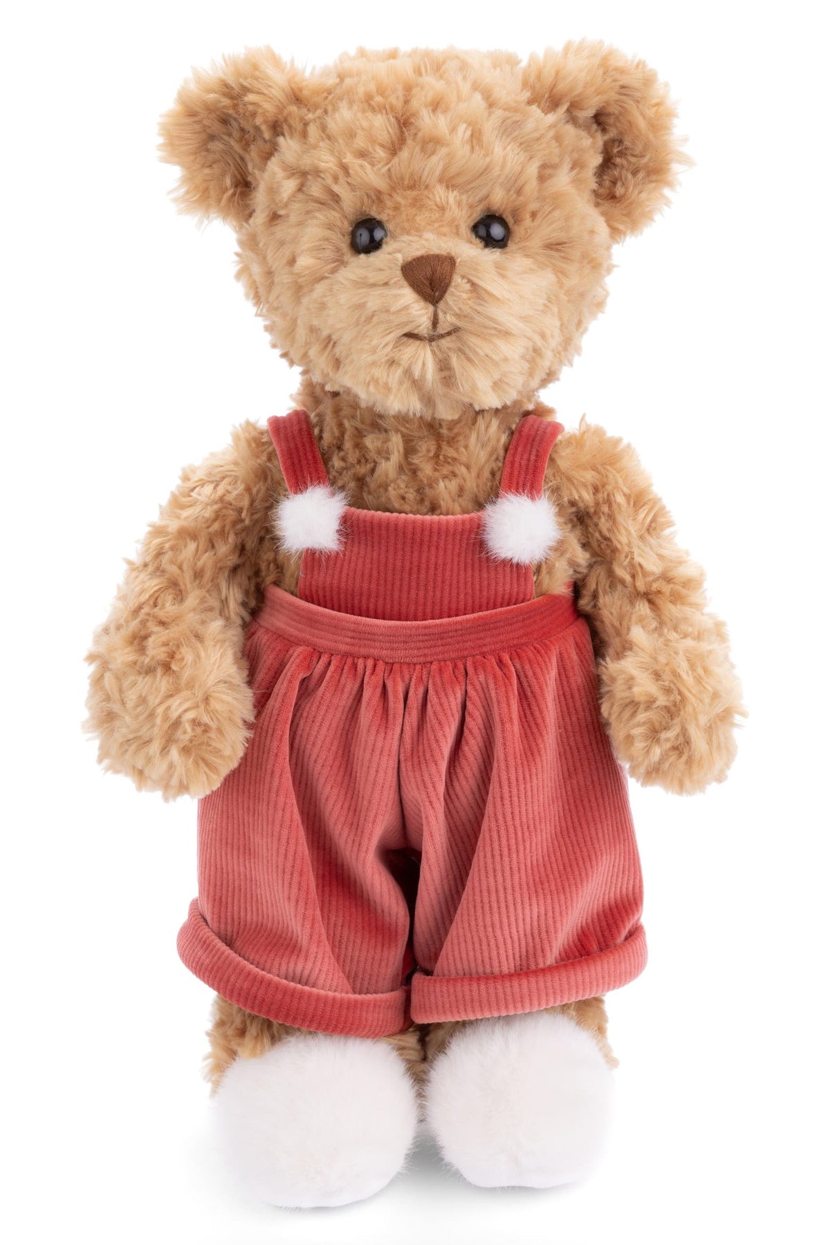 A plush teddy bear with light brown curly fur wearing red corduroy-style overalls with white pom-pom accents and white fluffy boots, photographed against a plain white background.