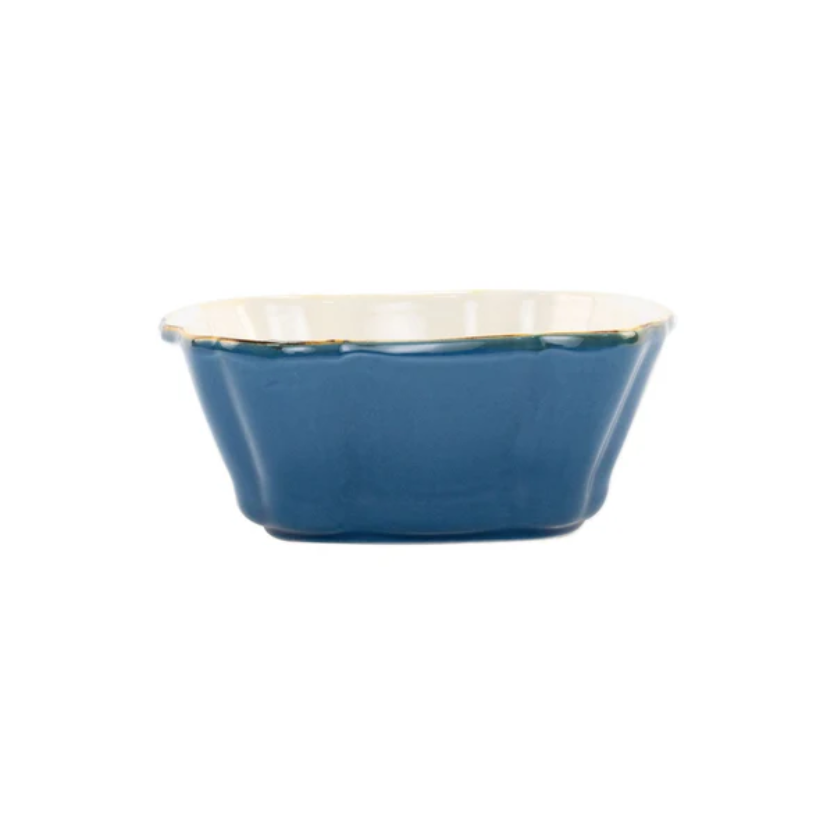 Blue square ceramic baker with white interior 