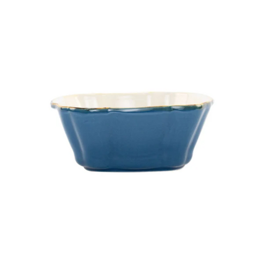 Blue square ceramic baker with white interior 