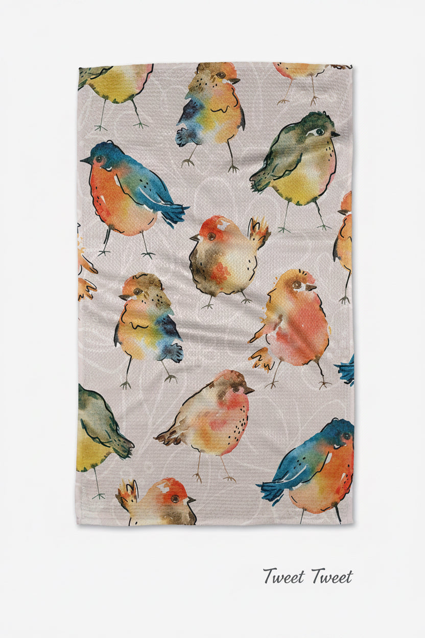 Geometry tweet tweet tea towel with colorful bird pattern on a white background