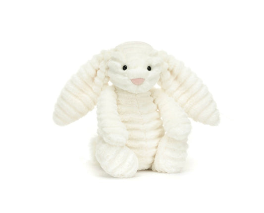 A plush toy resembling a lop-eared bunny with a fluffy white ribbed body, glossy eyes, and a silky tail by Jelly Cat