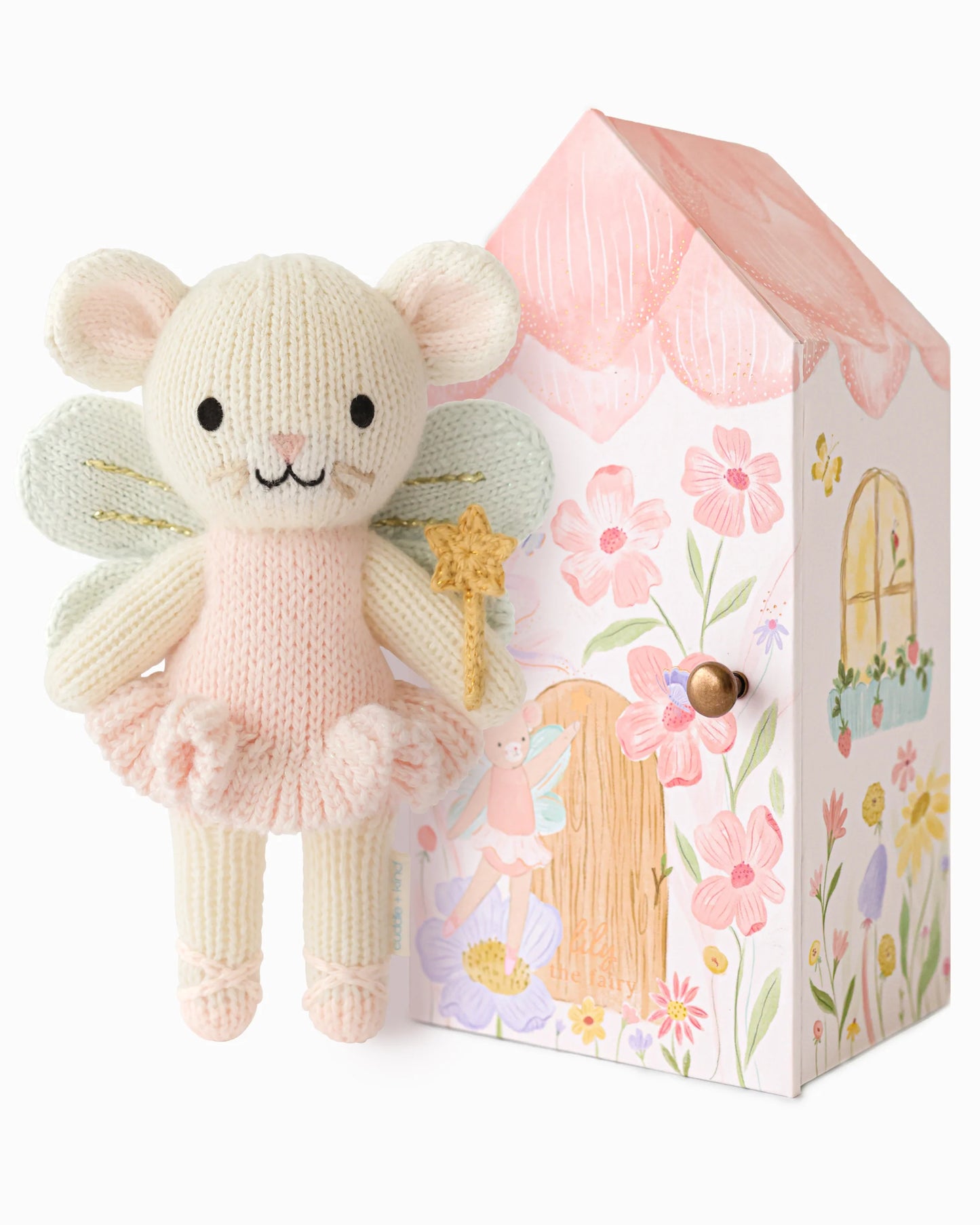Knitted fairy mouse toy with a decorative box featuring floral and fairy designs.