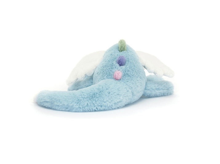 Blue plush toy with white wings on a white background