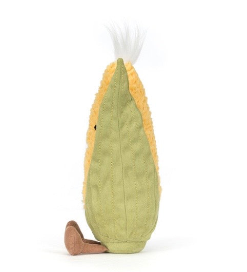 Plush ear of corn toy shaped like a green leaf with a brown stem on a white background