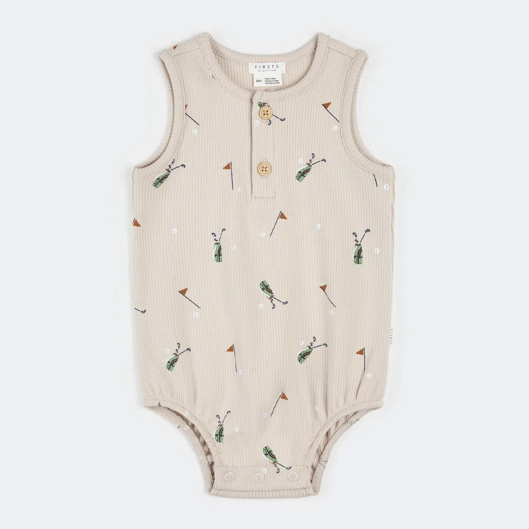 Sand Firsts by Petit lem baby romper with golf-themed pattern on a white background