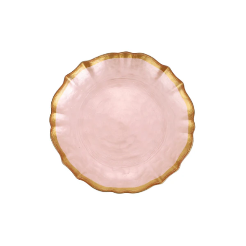 Pink plate with gold rim on a white background