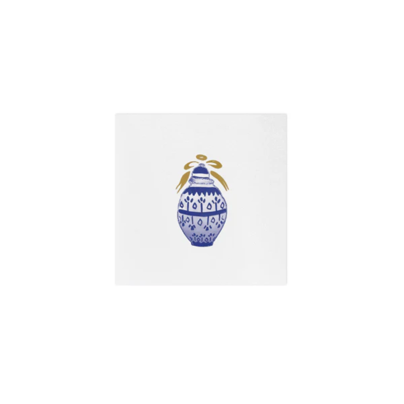 Decorative napkin with a blue and white patterned vase design on a white background