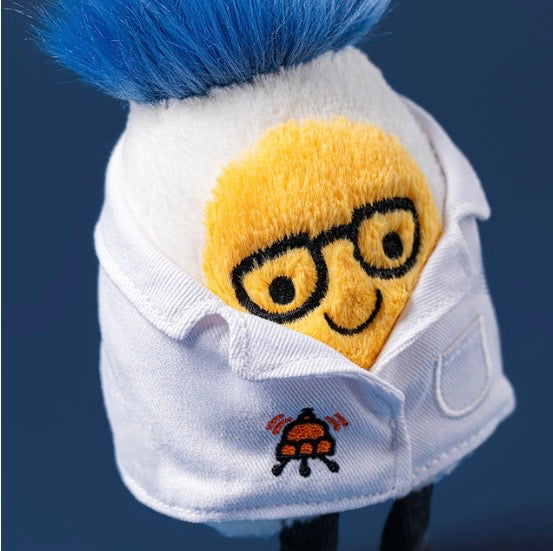 Plush boiled egg toy with a face wearing glasses and a white lab coat and blue hair