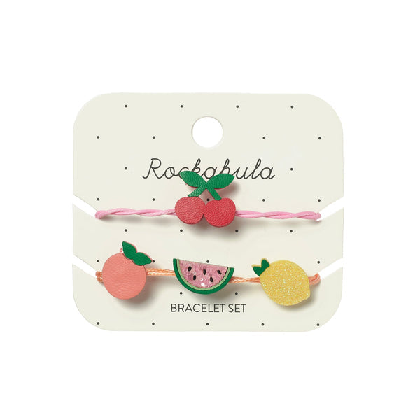 Set of two colorful bracelet designs on a 'Rockahula' branded card featuring summer fruit