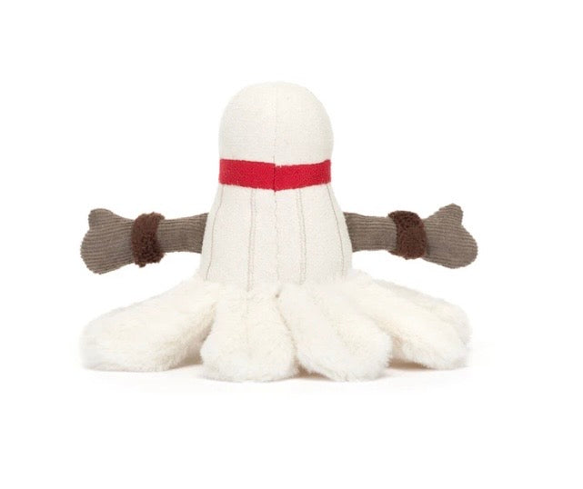 White plush toy with a red band and brown arms 
