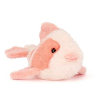 Plush toy guinea pig on a white background