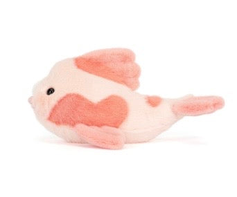 Plush toy fish with a heart pattern on a white background