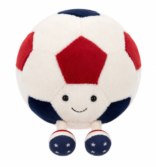 Plush toy soccer ball with a smiling face on a white background
