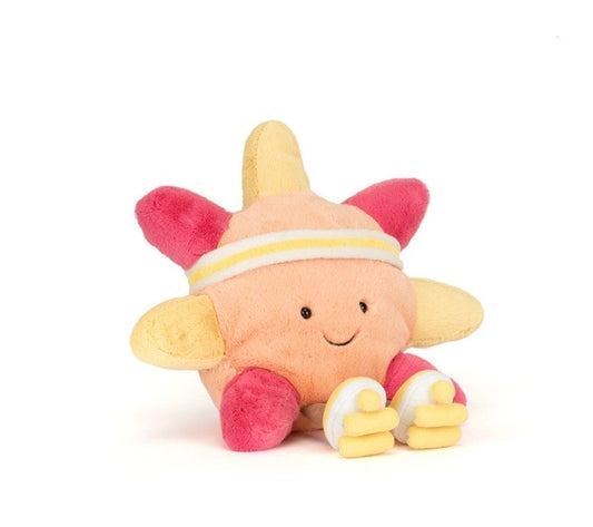 Plush toy with pink and yellow design on a white background