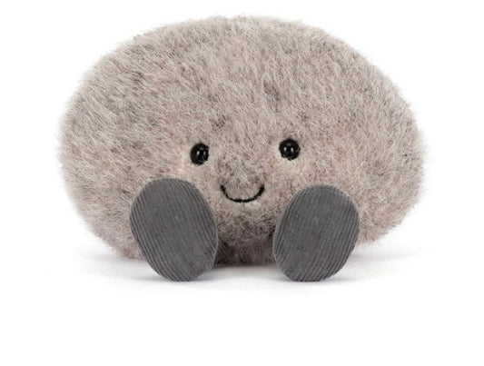 Plush toy resembling a mole on a white background