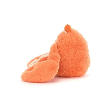 Plush toy resembling an orange crab on a white background