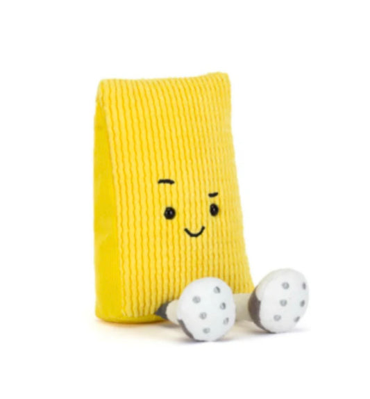 Yellow plush toy with a face on a white background