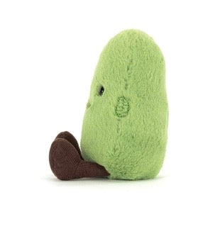 Plush avocado toy on a white background