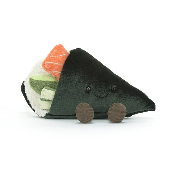 Plush toy resembling a piece of sushi with a smiling face on a white background