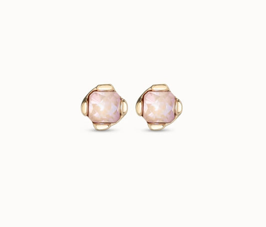 A pair of UNOde50 18k gold plated stud earrings with pink faceted crystals, part of the Charismatic collection.