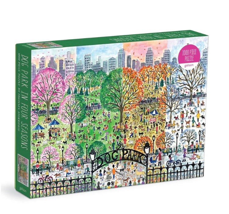 Jigsaw puzzle box featuring a colorful illustration of a dog park in four seasons.