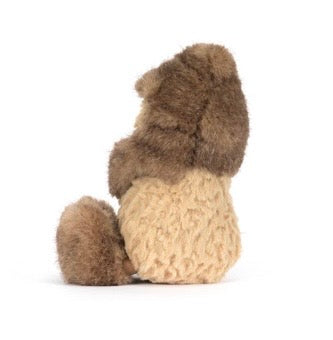 Stuffed animal toy with gradient fur colors on a white background