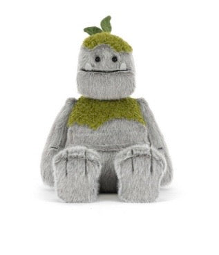 Plush toy resembling a creature with a green top hat and body on a white background