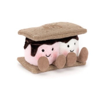 Two plush toys resembling marshmallows in a sandal on a white background