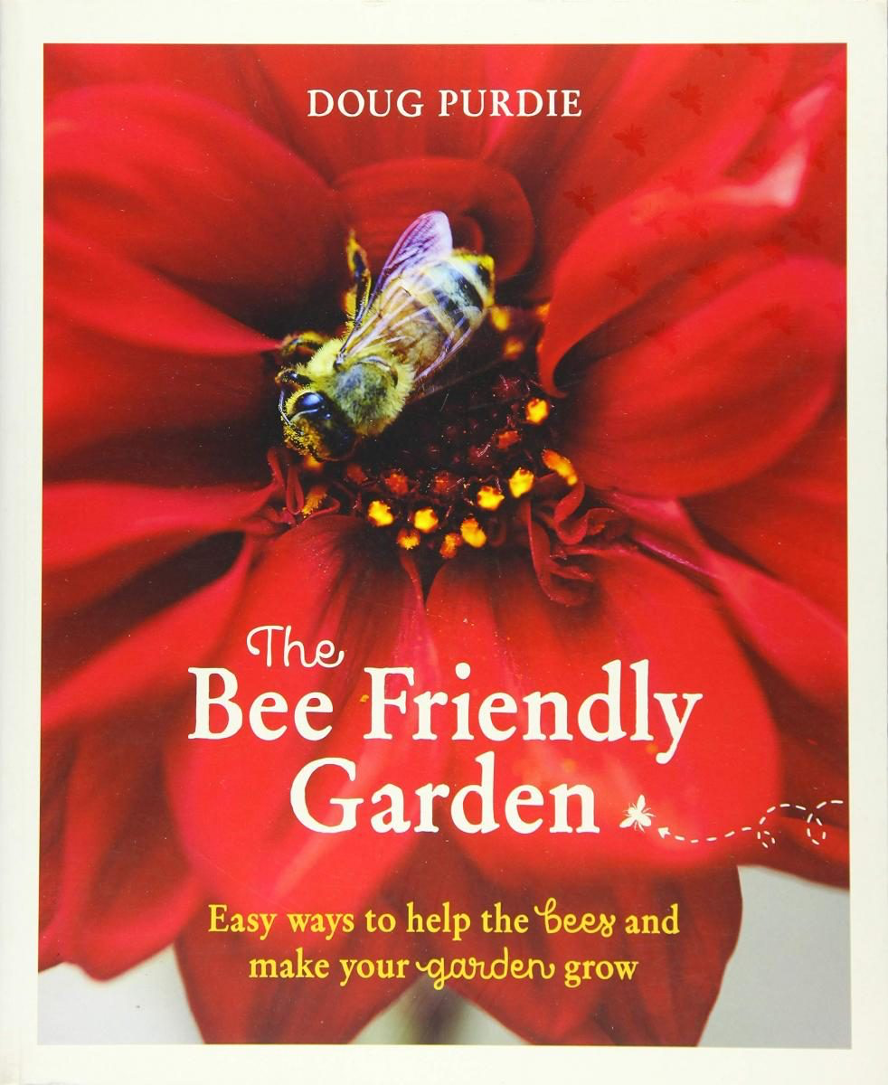 Book cover of 'The Bee Friendly Garden' with a red flower and bee on a white background