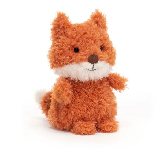 A small plush fox toy with curly orange-brown fur, a white chest and tail tip, and a brown stitched nose, photographed on a clean white background.