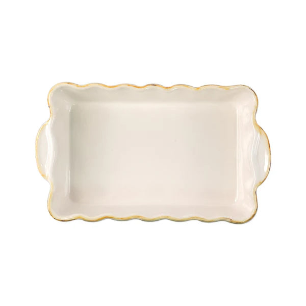 Rectangular ceramic dish with scalloped edge and gold trim 
