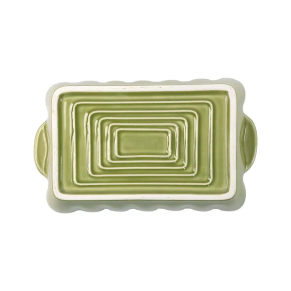 Green ceramic dish with concentric circle design 