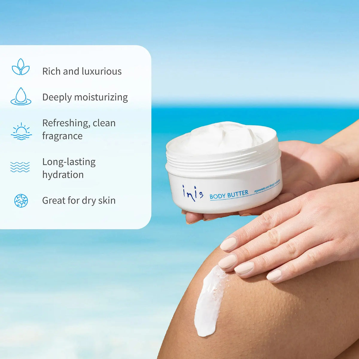 Person applying body butter to their leg with a blue sky background