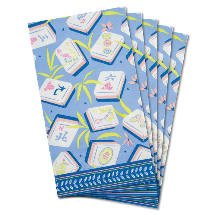 paper guest towels with a mahjong design with tiles on a blue background