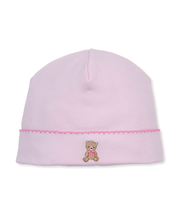 kissy kissy teddy bear club light pink knit beanie hat featuring a folded cuff with a pink scalloped edge and a small embroidered teddy bear wearing a pink bow on the front.